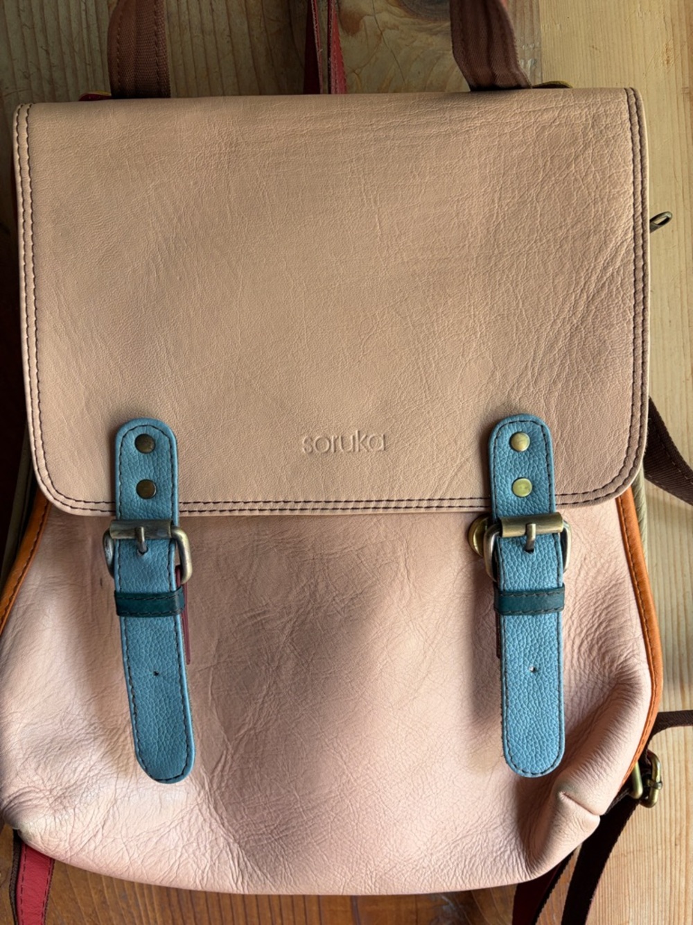 Soruka Soft Pink Leather Backpack with Blue Accent Straps